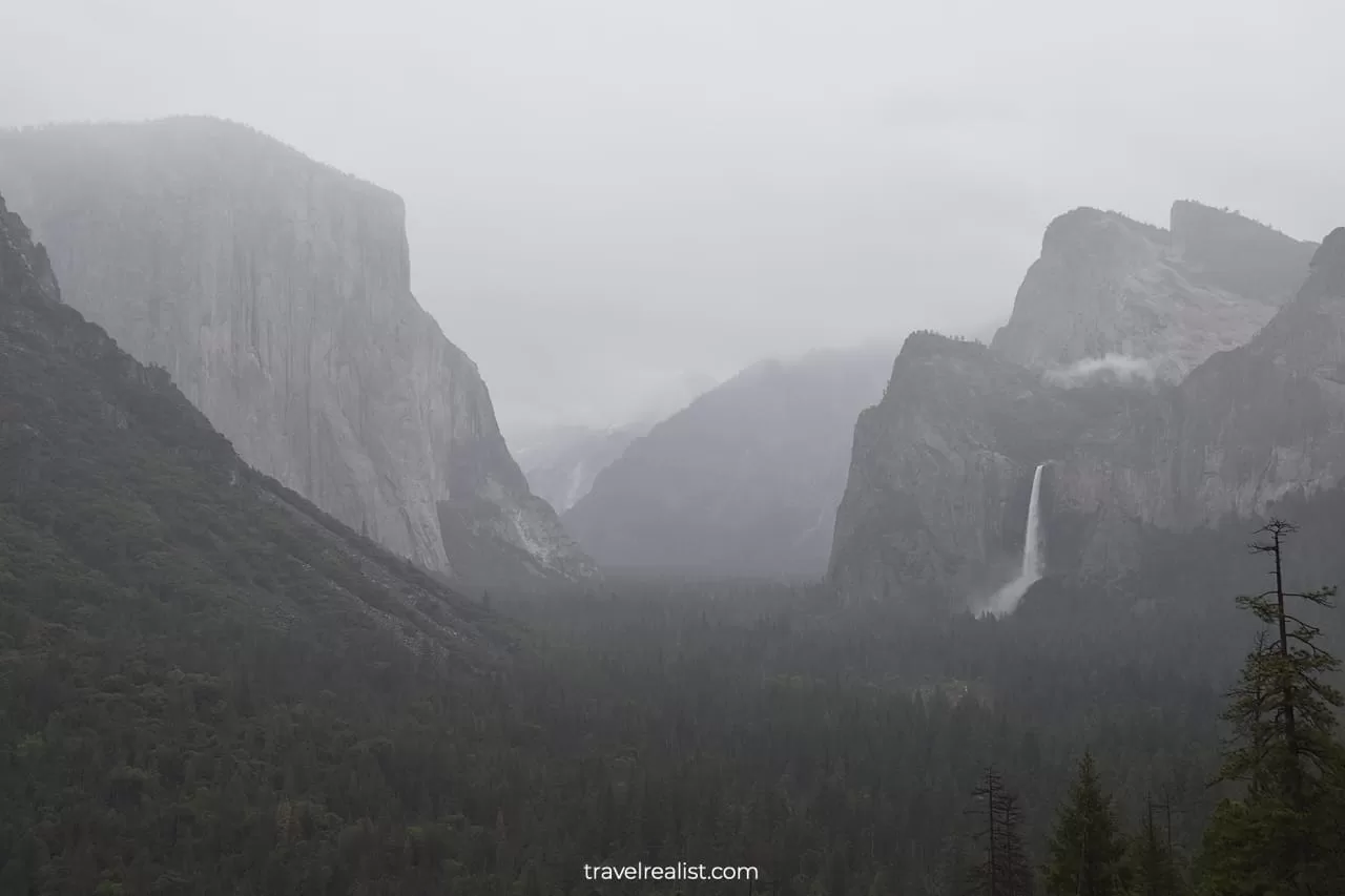 Foggy and rainy view of Yosemite Valley at Artist Point in Yosemite National Park, California, US