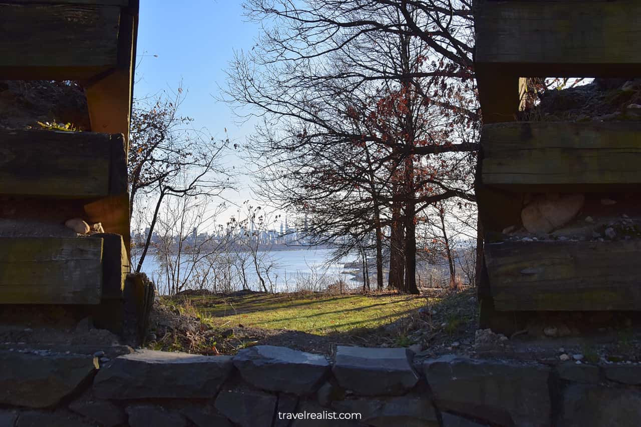 Manhattan Skyline views from gap of fortifications in Fort Lee Historic Park, New Jersey, US