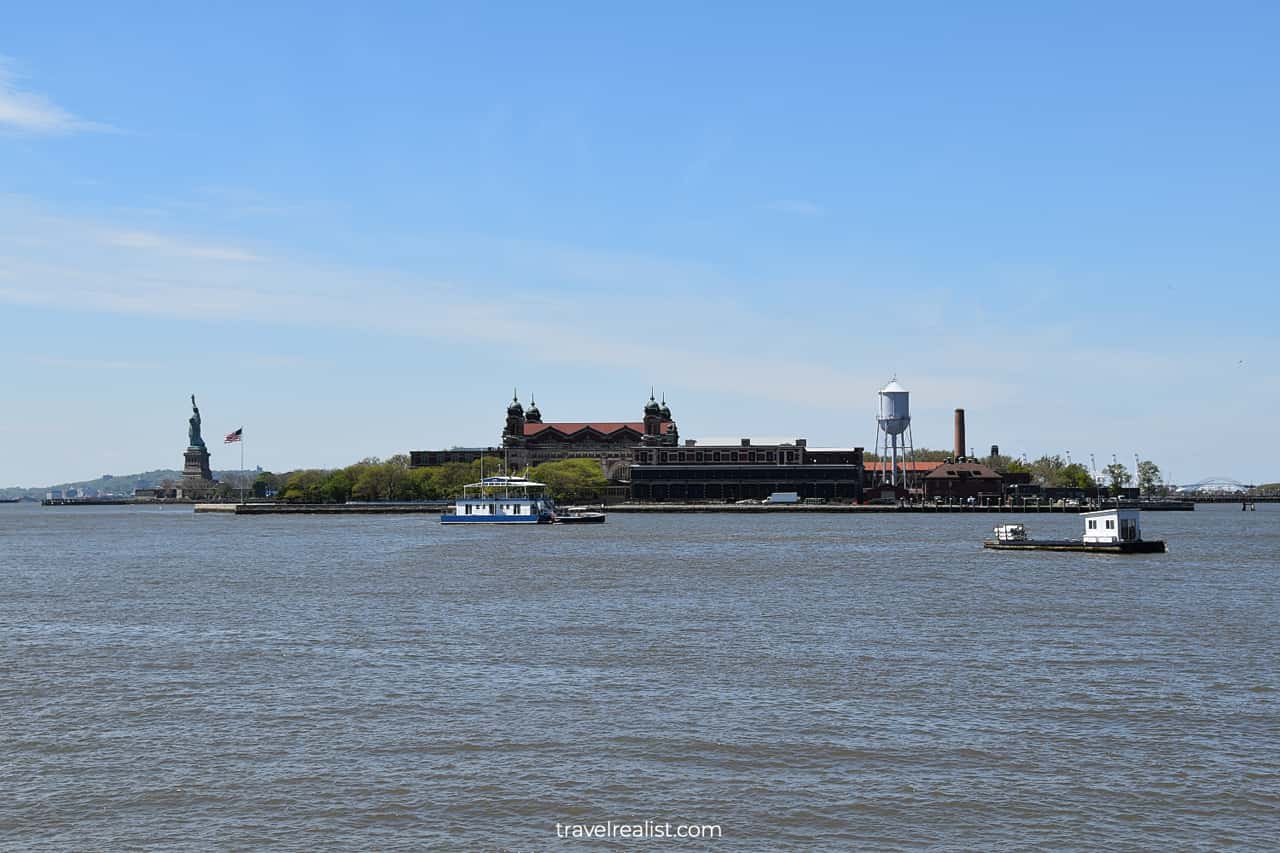Ellis Island and Statue of Liberty as seen from boat in New Jersey, US