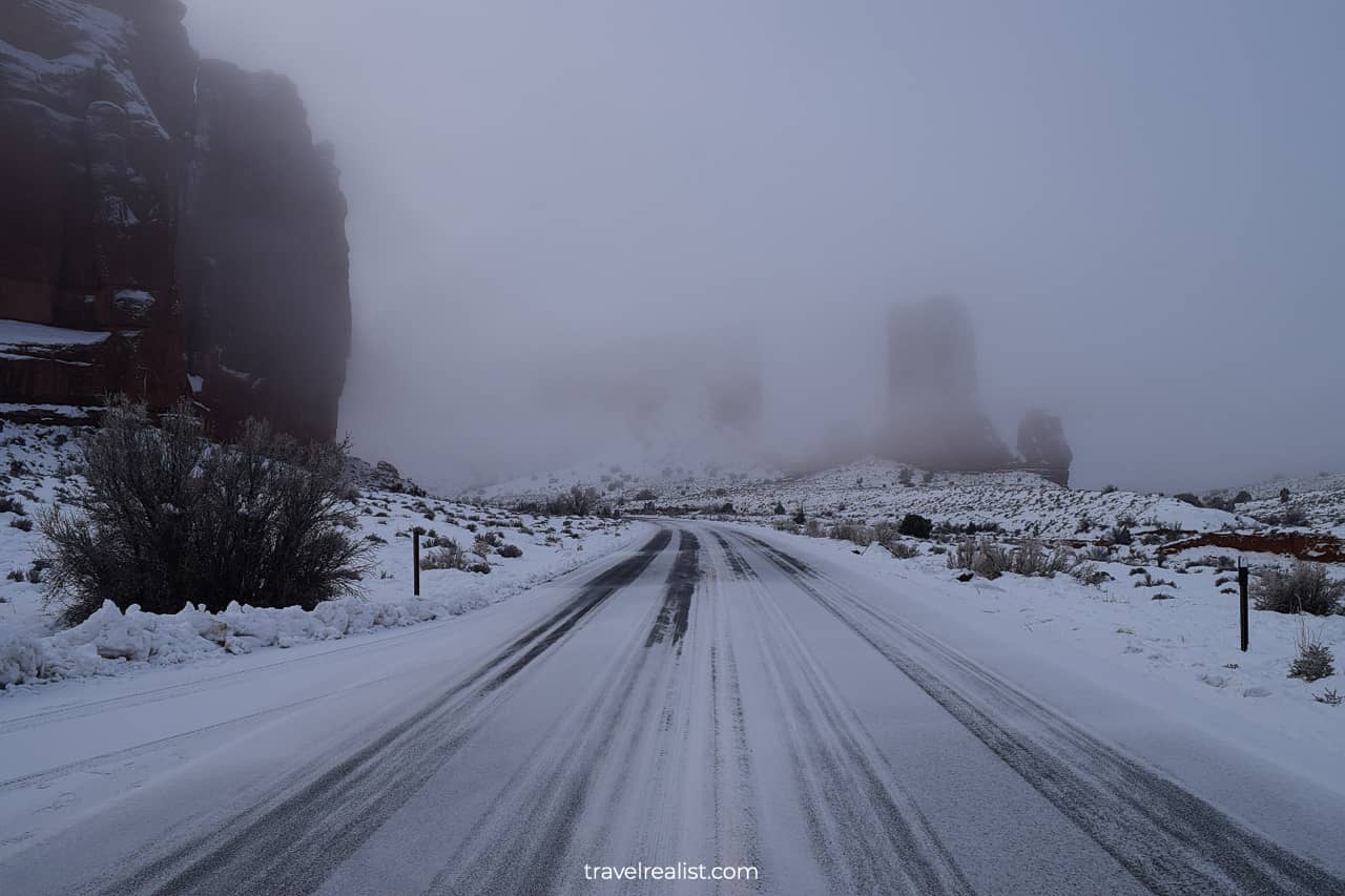 Winter snow covered road in Arches National Park, Utah, US