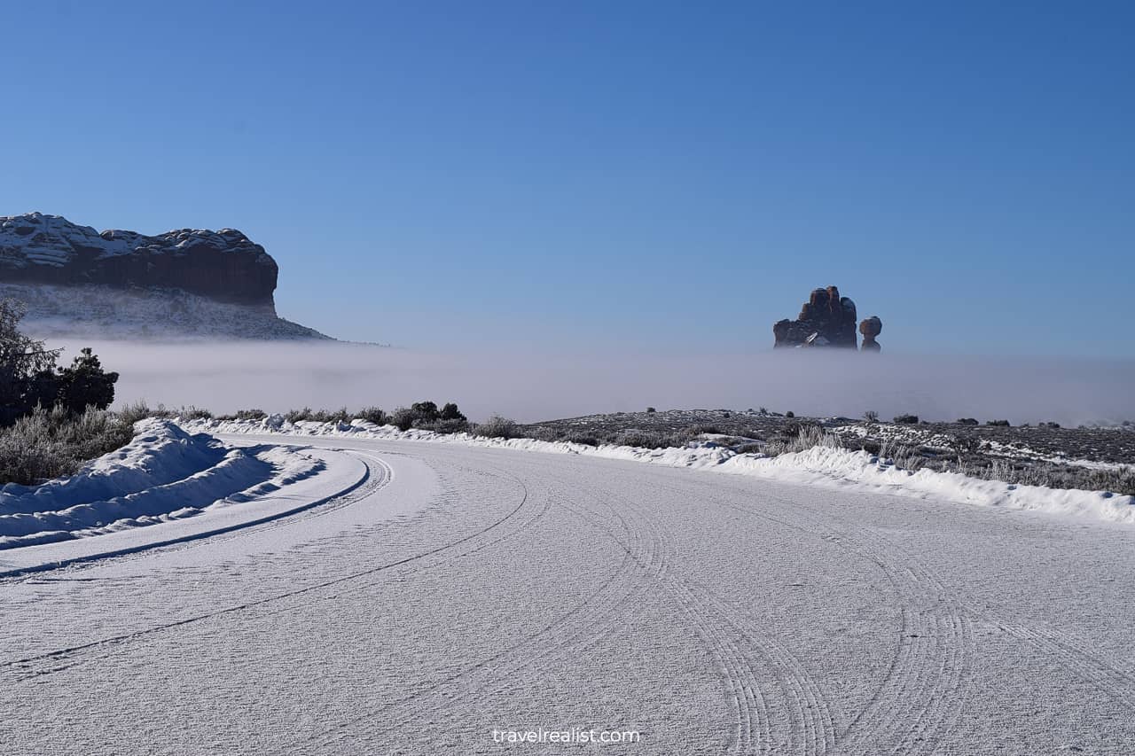Winter snow covered road in Arches National Park, Utah, US