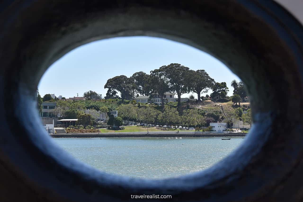 A view towards Black Point Historic Gardens from bull's-eye of Steam Tug Hercules in San Francisco Maritime National Historic Site in San Francisco, California, US