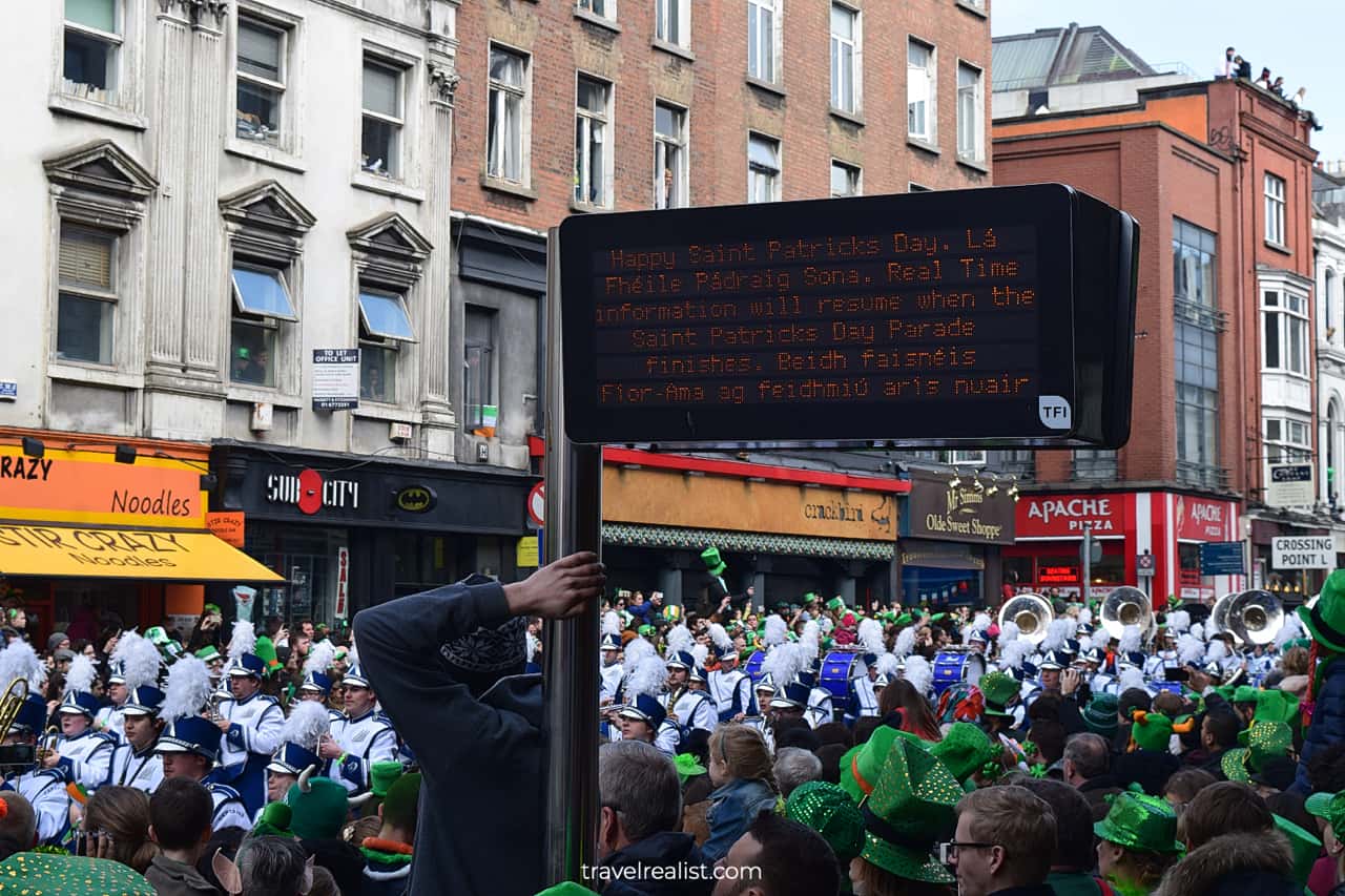 Spectators enjoying Marching band performance during St Patrick's Day Parade in Dublin, Ireland