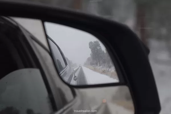 Driving during snowfall in Grand Canyon National Park, Arizona, US