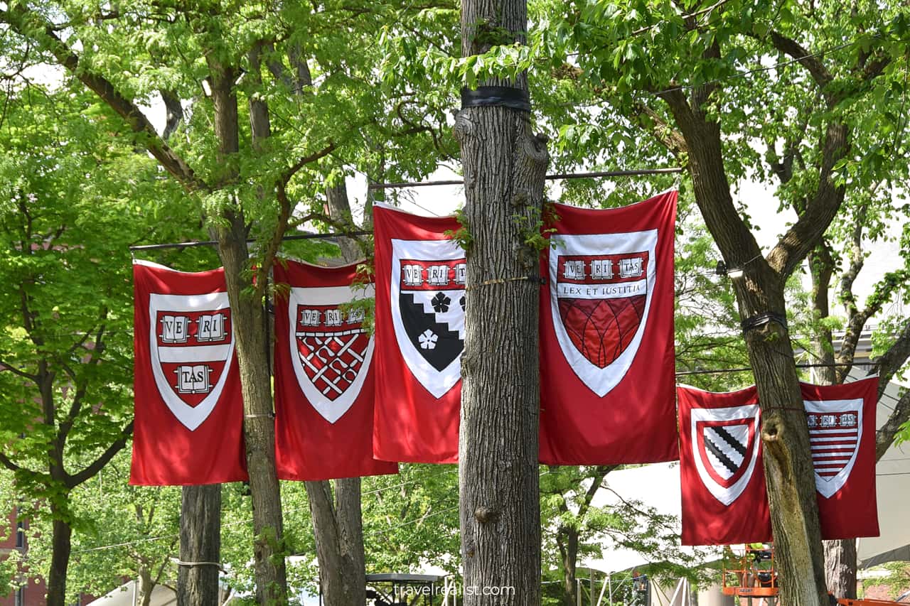 Harvard School signs during graduation in Harvard Yard in Cambridge, Massachusetts, US