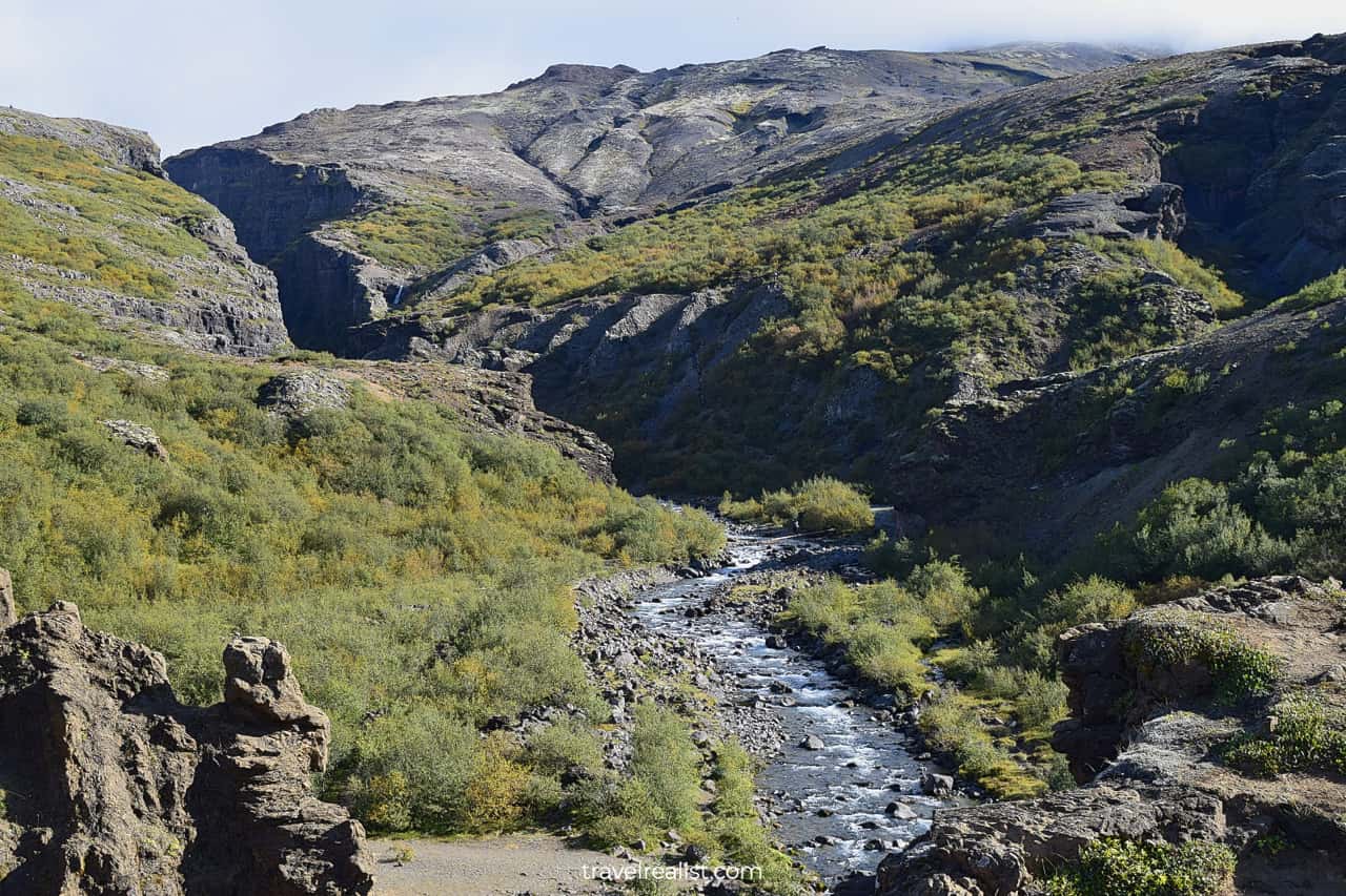 Creek and uphill trail section towards Glymur Waterfall in Iceland