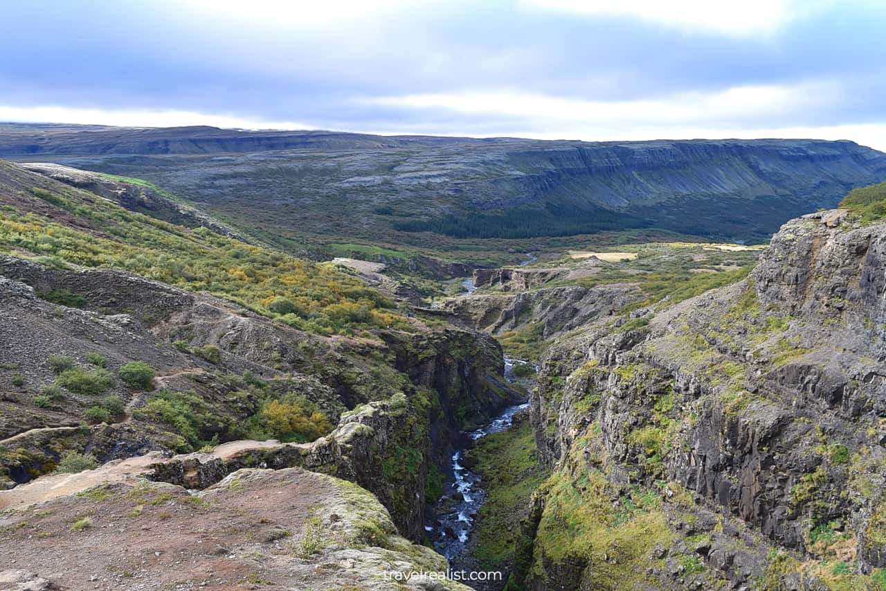 Creek and steep narrow canyon near Glymur Waterfall in Iceland