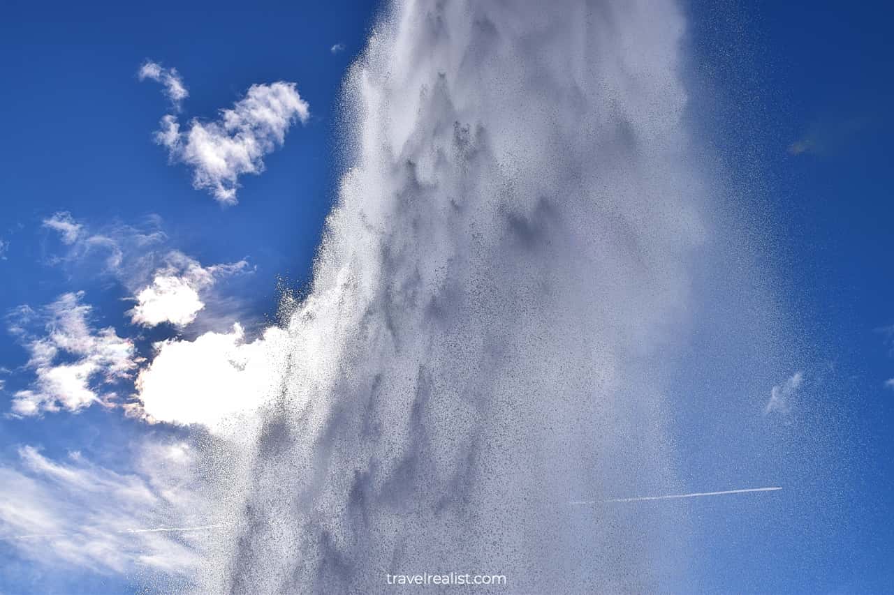 Water in air after Strokkur geyser eruption on Golden Circle map in Iceland
