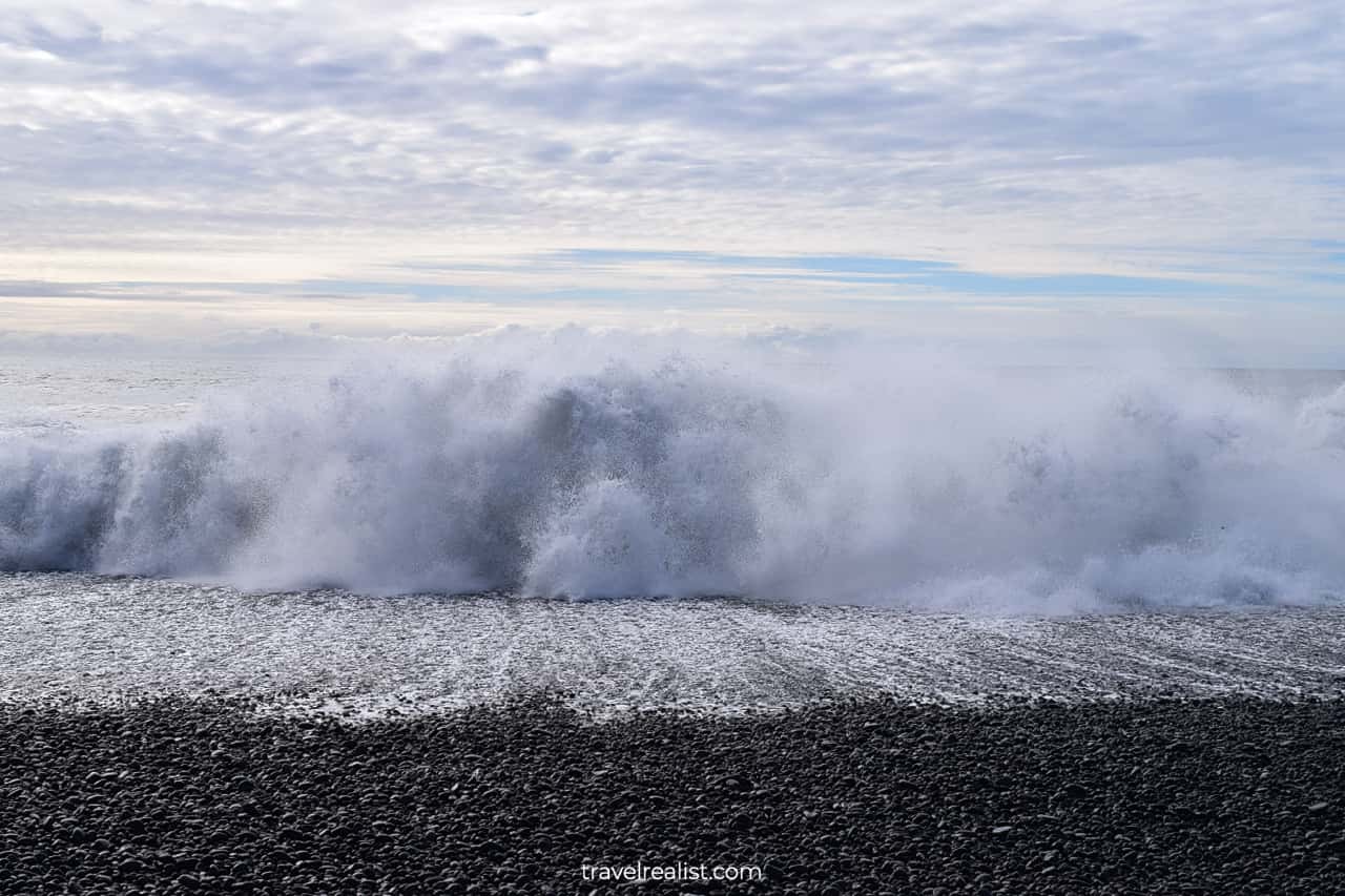 Breaking waves of Atlantic Ocean at Reynisfjara Black Sand Beach in South Iceland