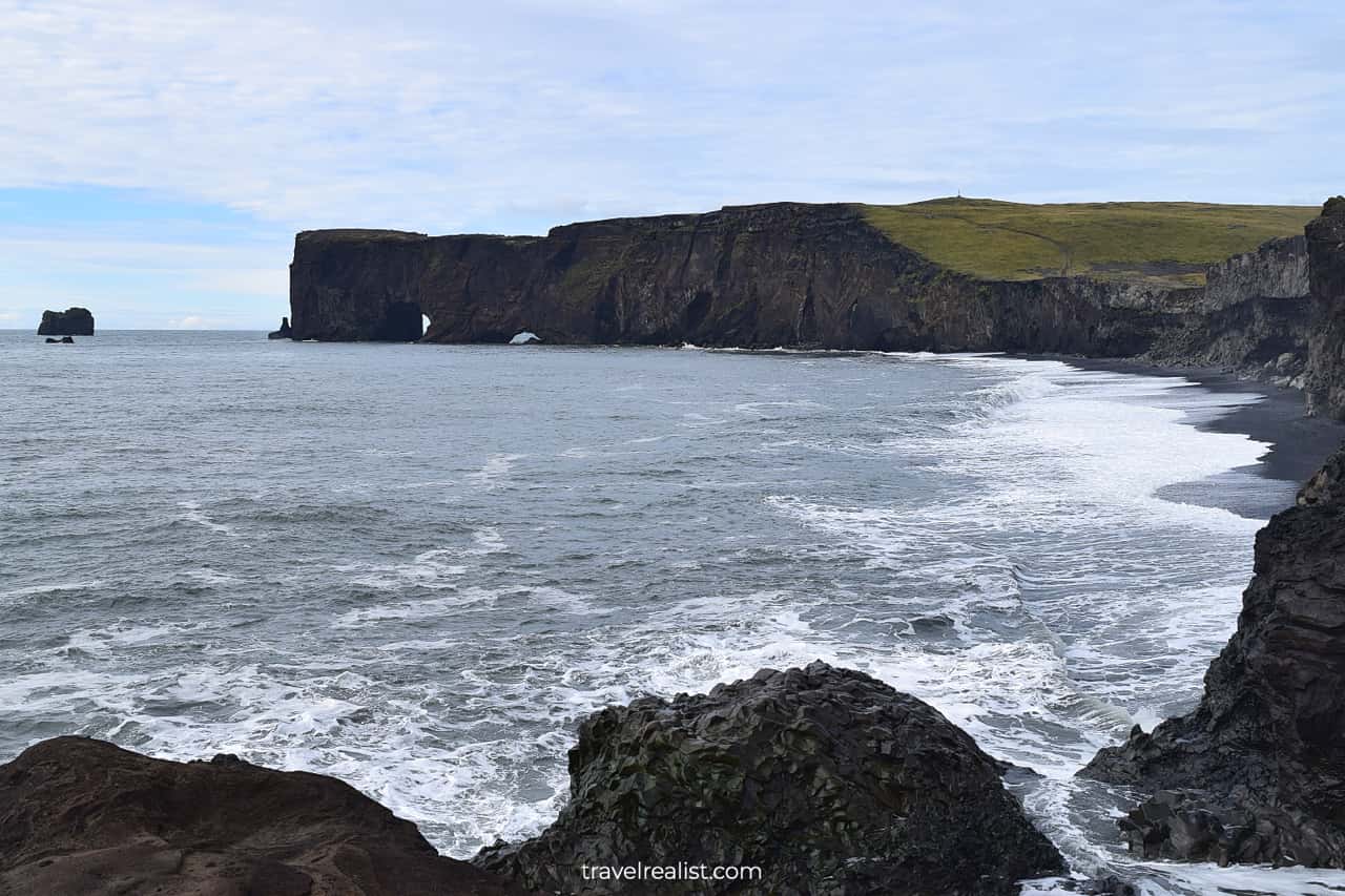 Dyrhólaey sea arch and Kirkjufjara Black Sand Beach in South Iceland