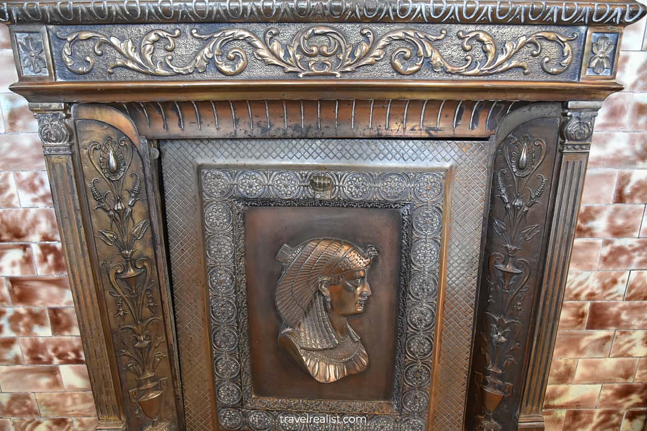 Fireplace with an Egyptian pattern in Meeker Mansion in Puyallup, Washington, US