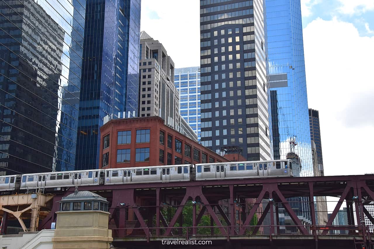 L train crossing the Chicago River via Lake Street Bridge in Chicago, Illinois, US