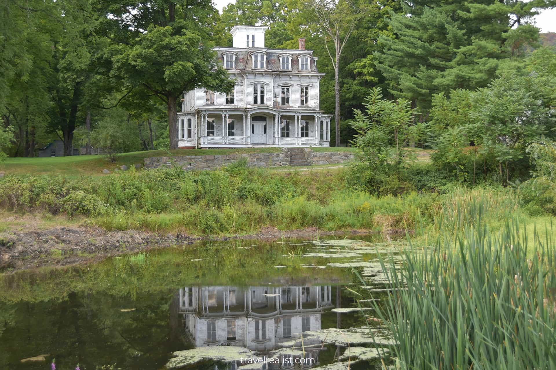 Peter Smith House reflections in canal in Waterloo Village Historic Site, New Jersey, US