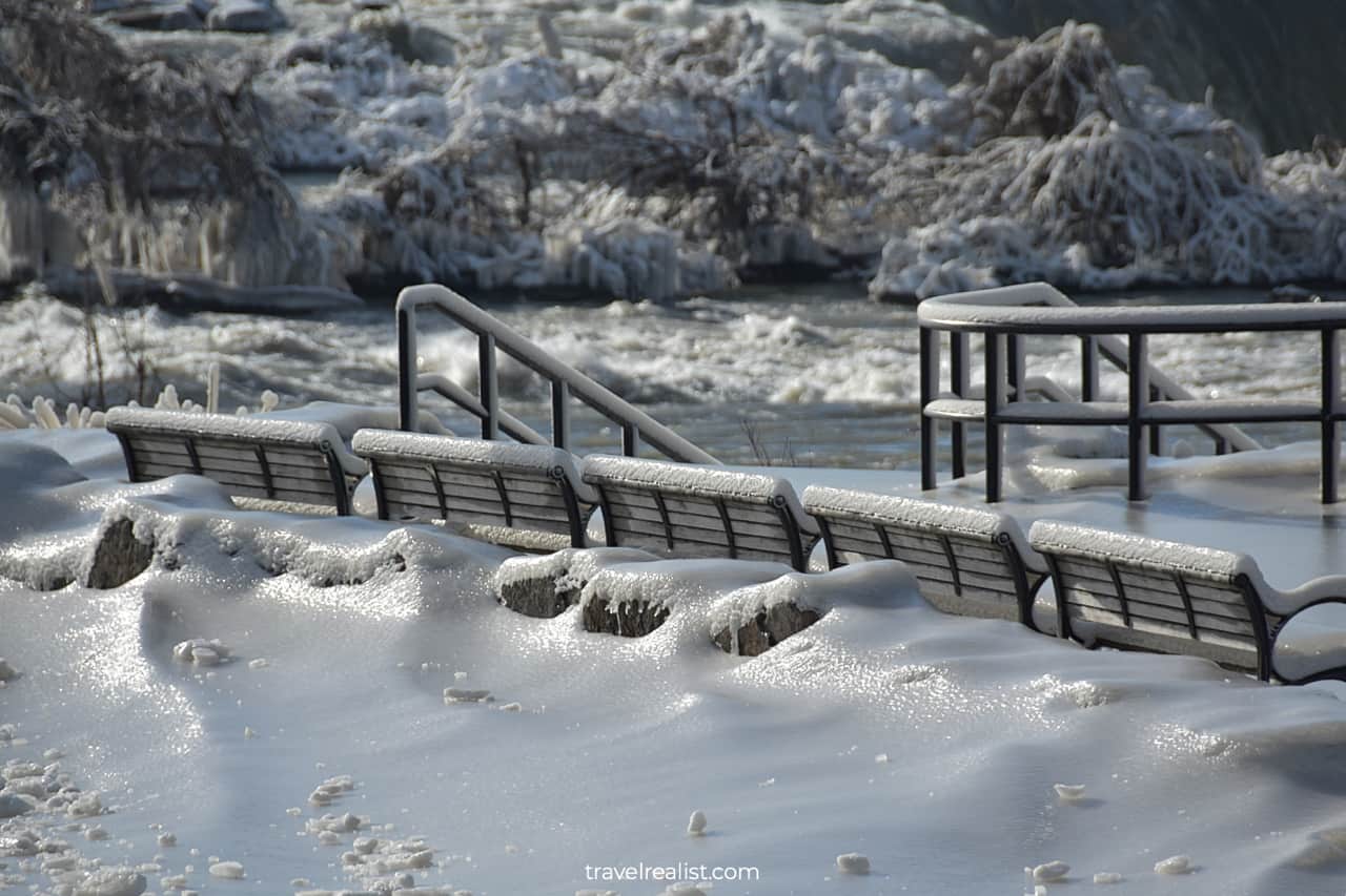 Ice and snow on benches and railings in Niagara Falls State Park, New York, US
