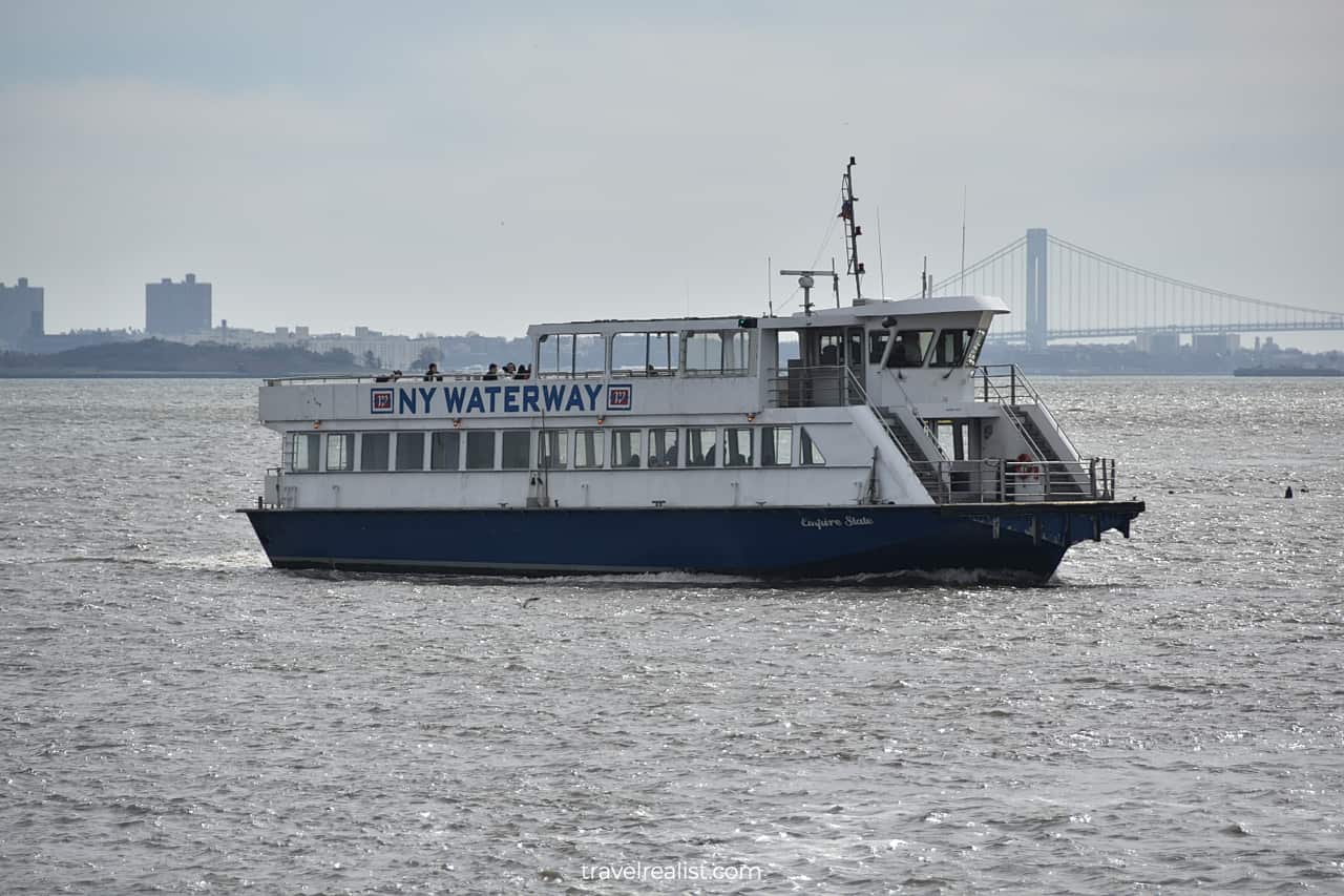 Ferry boat crosses Hudson River between Hoboken, New Jersey and Manhattan, New York, US