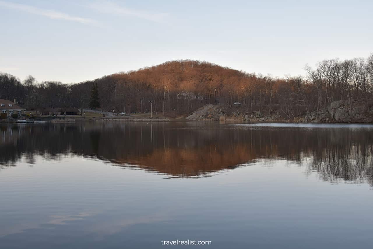 Hill reflections in lake in Silas Condict County Park, New Jersey, US