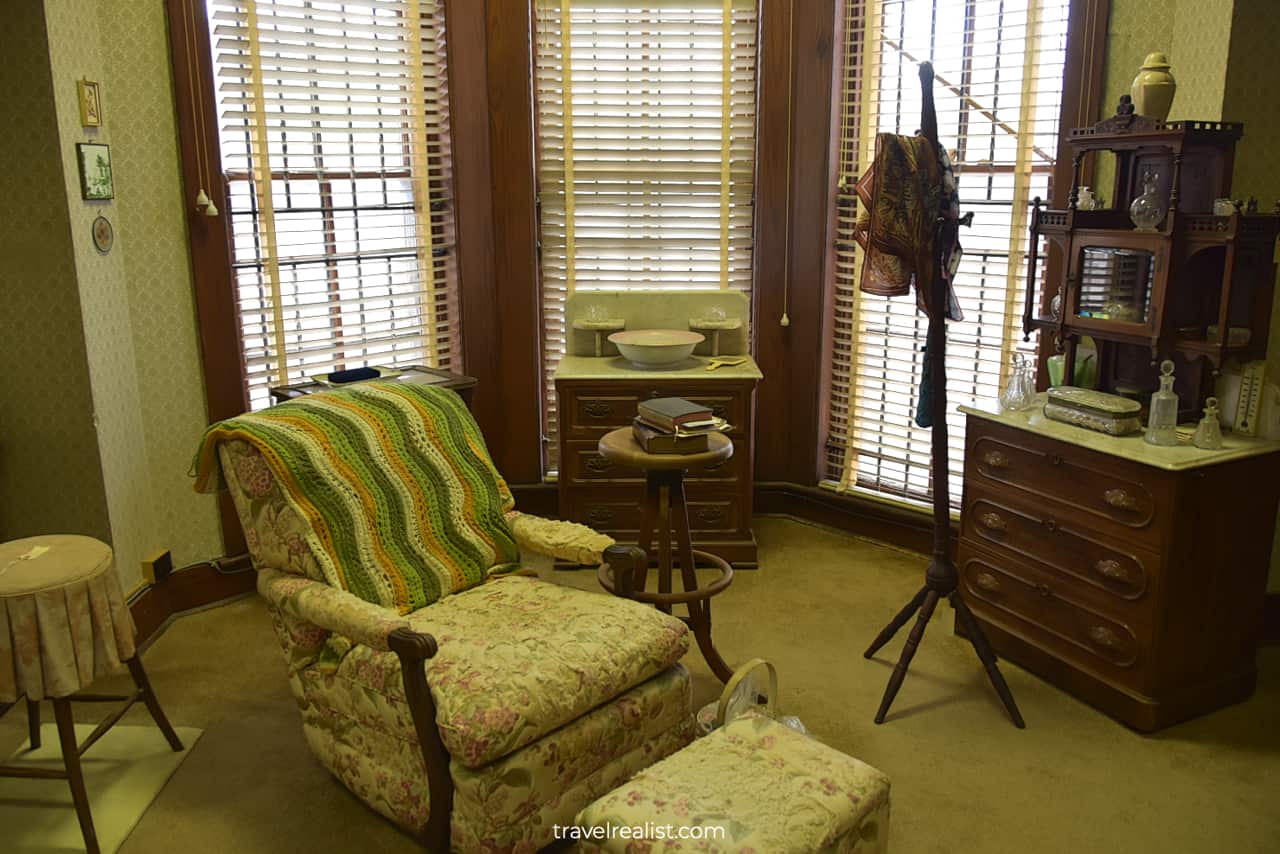 Armchair in East Bedroom in Flower Hill Urban Homestead museum in Austin, Texas, US