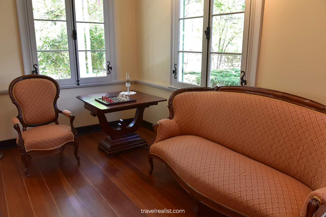 Chair and futon in French Legation State Historic Site in Austin, Texas, US