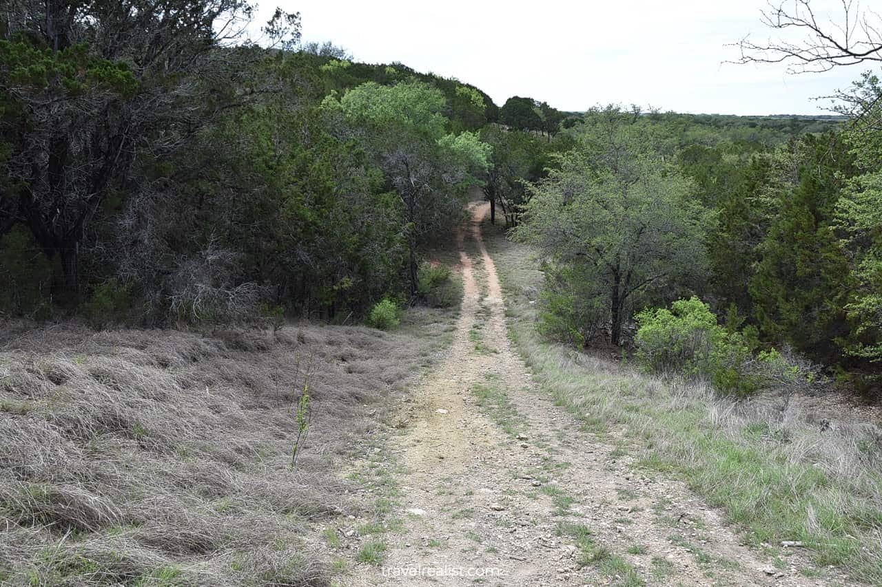 Country road in Grelle Recreation Area in Spicewood, Texas, US