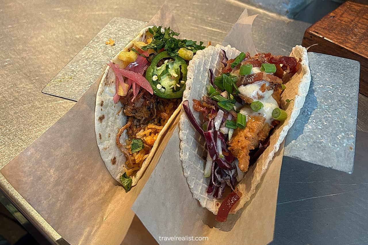 Two fully loaded tacos at joint in US