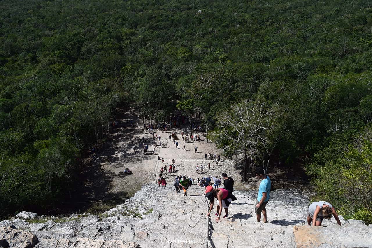 Climbing pyramid with tourists in Coba, Mexico