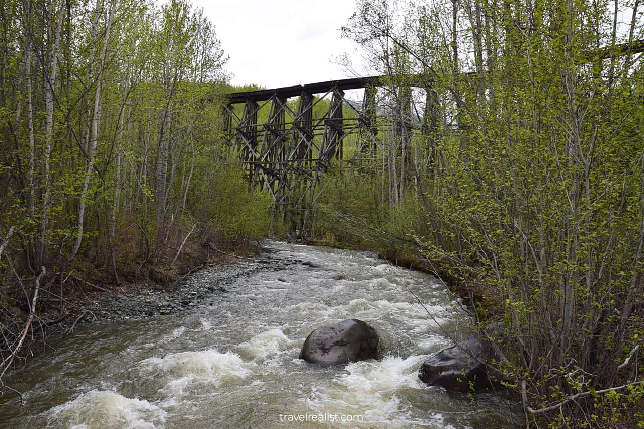 Old Railway Bridge and creek in Wrangell-St. Elias National Park & Preserve, Alaska, US
