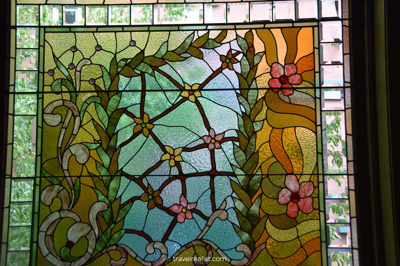 Detailed ornament stained glass window at Molly Brown House Museum in Denver, Colorado, US