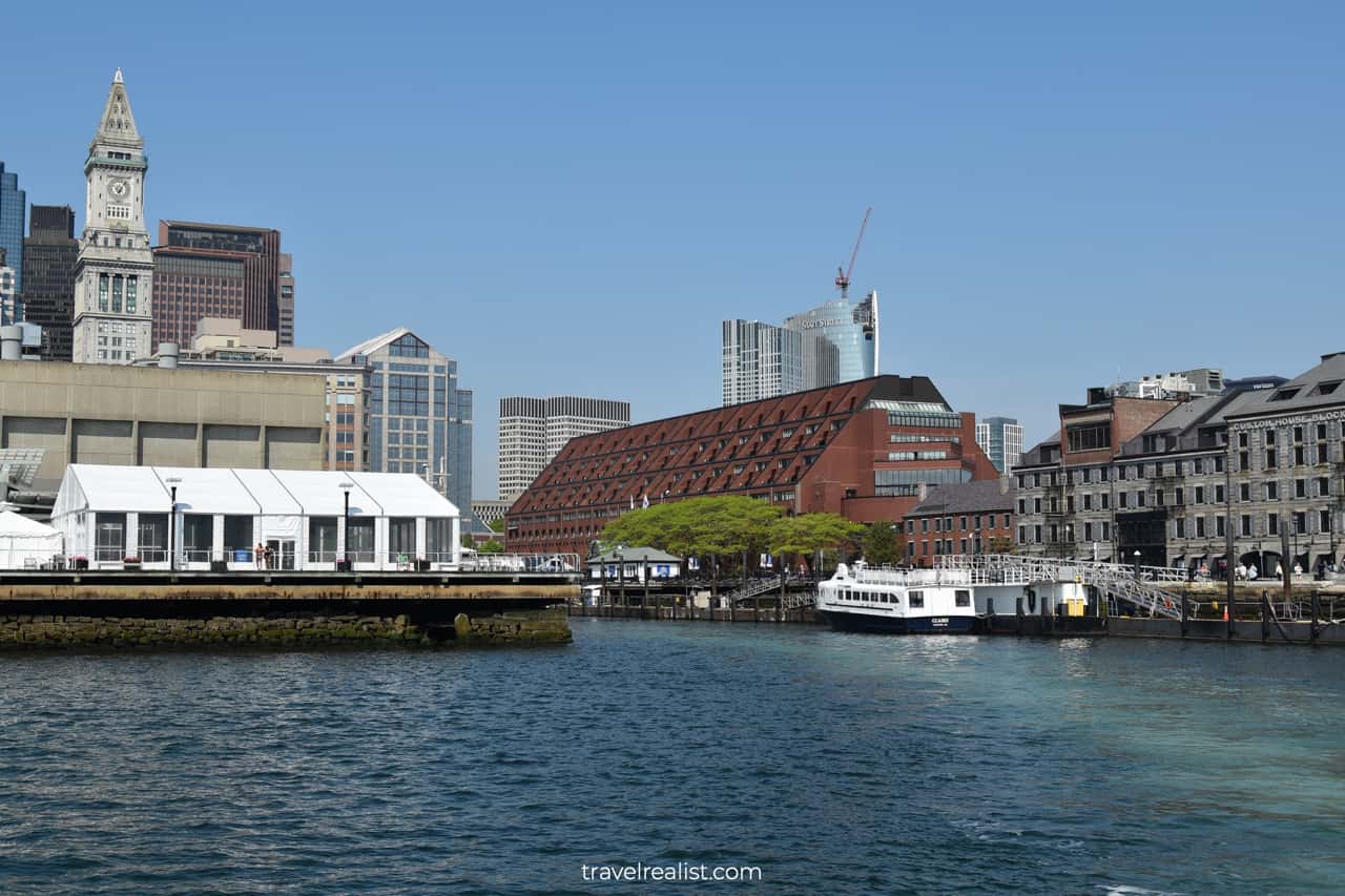 Long Wharf and Custom House Tower from whale watching boat tour in Boston, Massachusetts, US