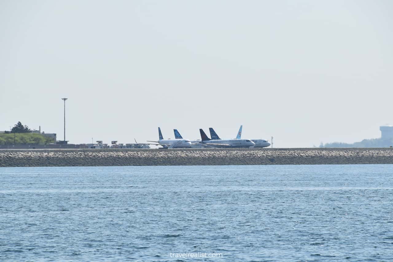 Boston Logan Airport view from boat in Boston, Massachusetts, US